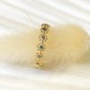 La bague LENA or jaune 18K Fairmined sertie de saphirs bleus