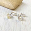 Les boutons de manchette Justin en argent 925 et quartz rutile.