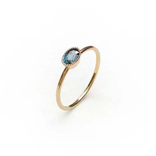 La bague Clémence en or rose 18 carats Fairmined et saphir teal d'Auvergne, pièce unique taille 54