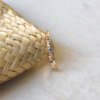 La bague VERA en or rose 18 carats Fairmined sertie de saphirs Teal