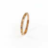 La bague VERA en or rose 18 carats Fairmined sertie de saphirs Teal
